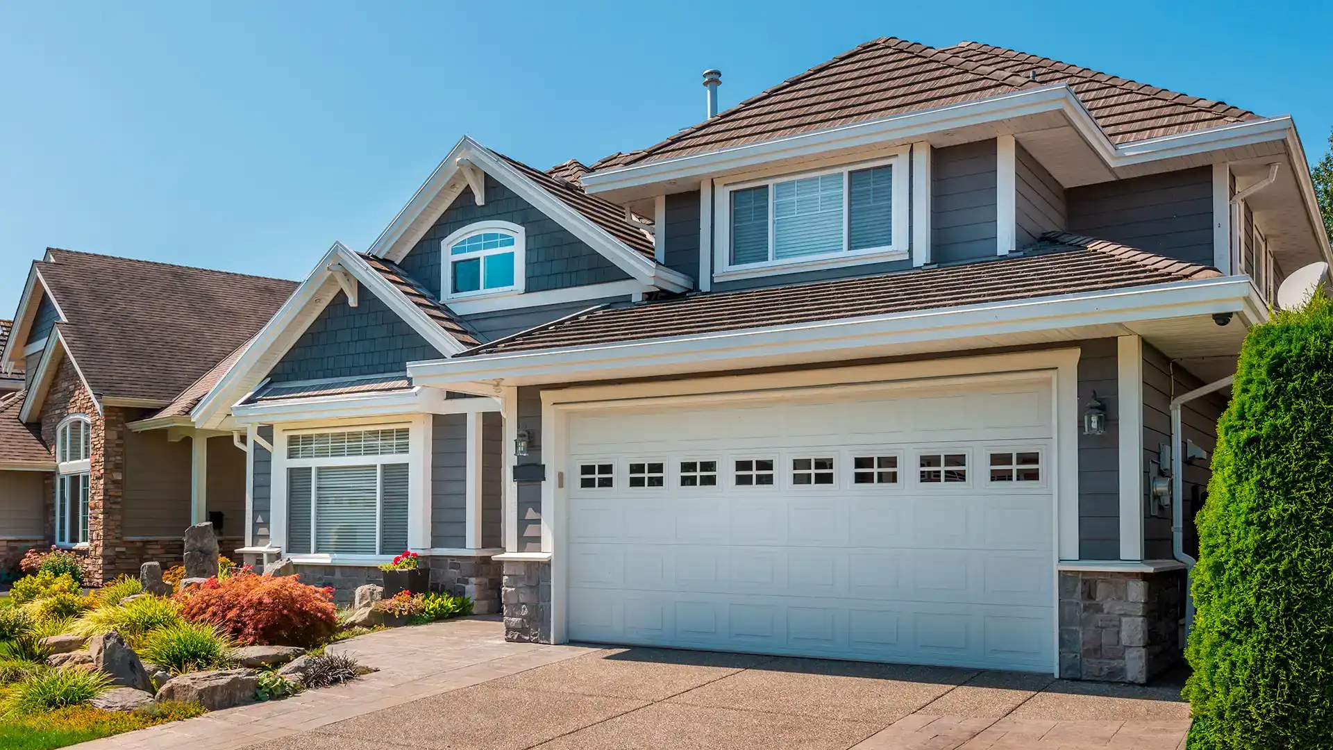 Why Do Some New Garage Doors Struggle During Long Island Winters?